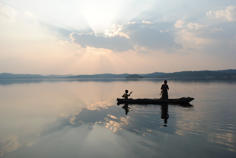 Silhouettes on a calm lake