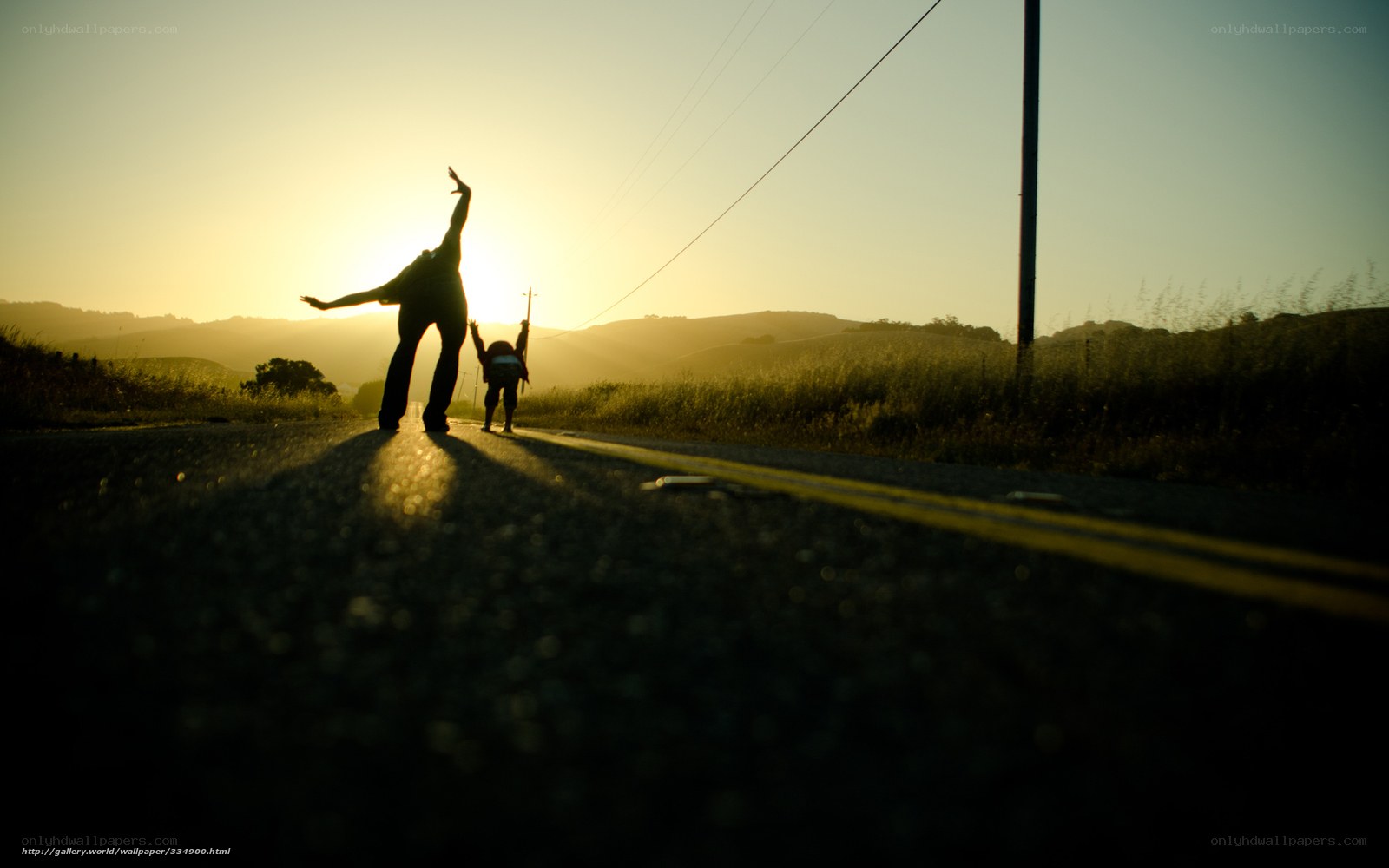Silhouettes on a country road