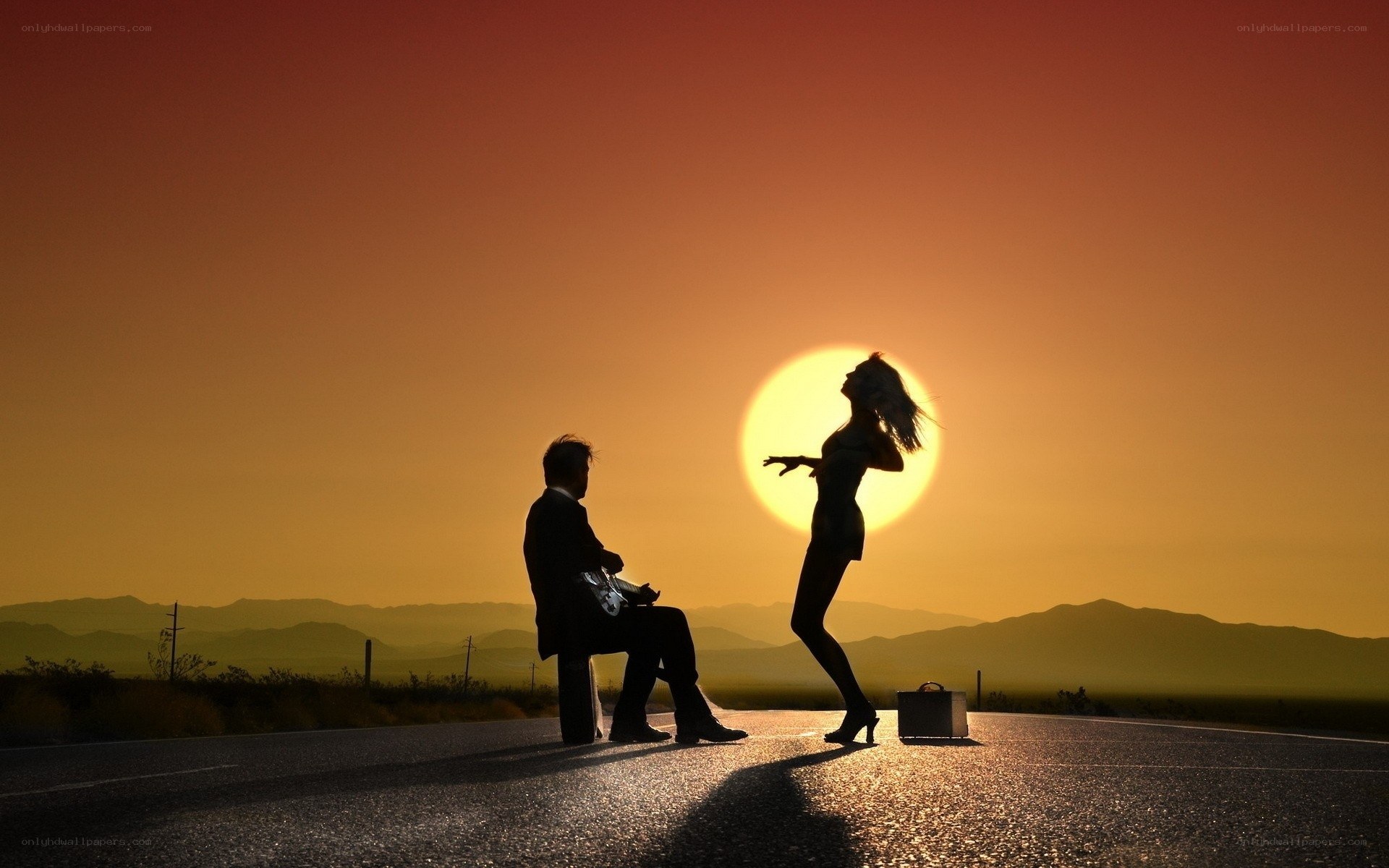 Silhouettes on a desert road