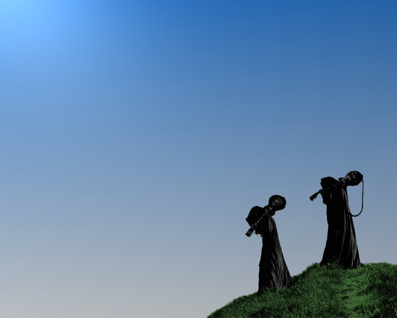 Silhouettes on a grassy hill