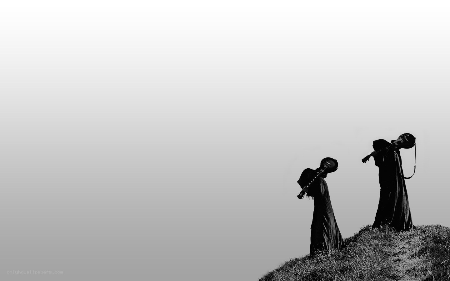 silhouettes on a hill