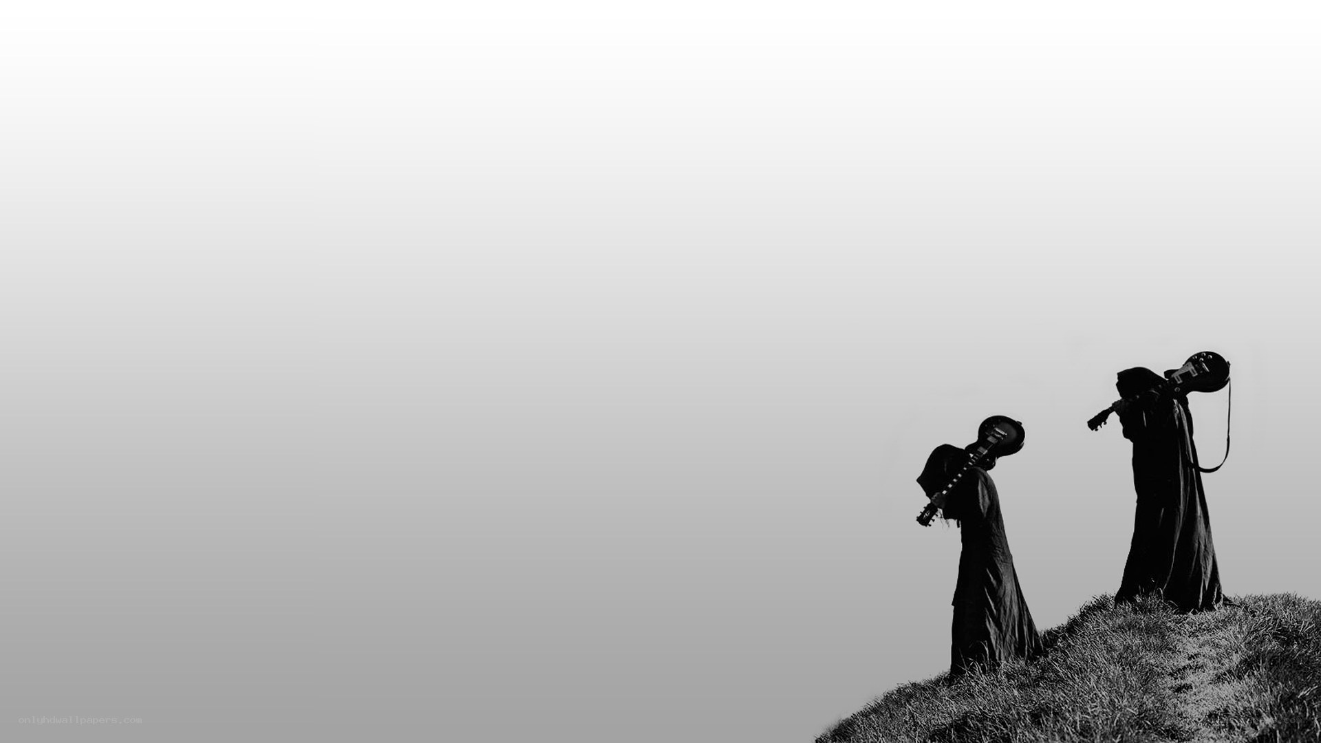 silhouettes on a hill