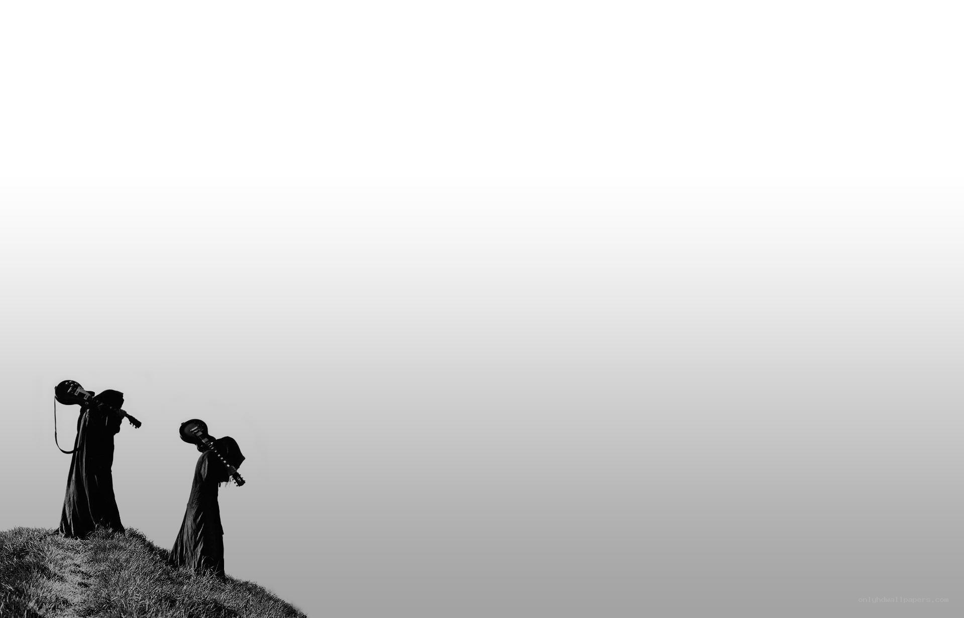 silhouettes on a hill