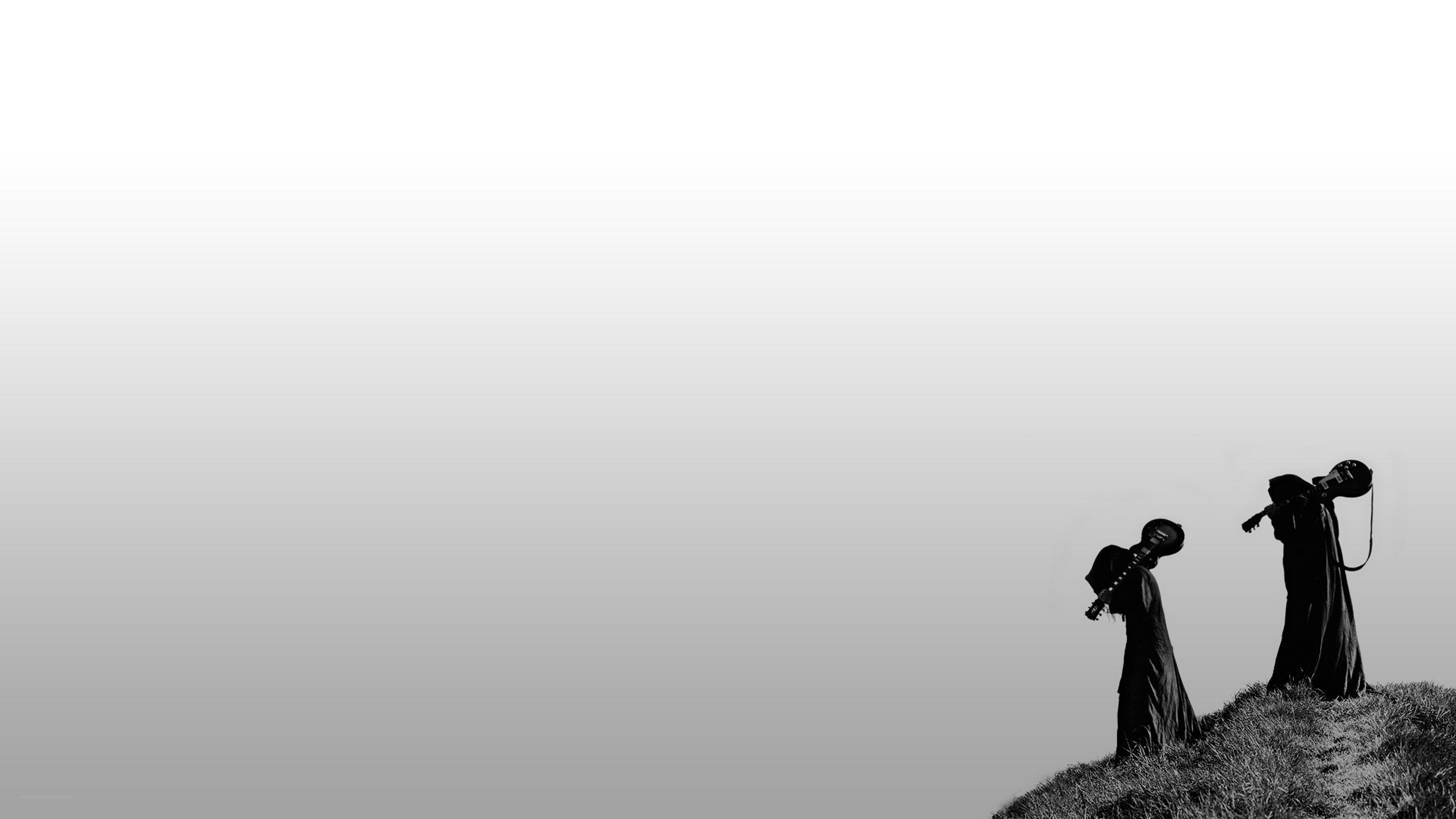 silhouettes on a hill
