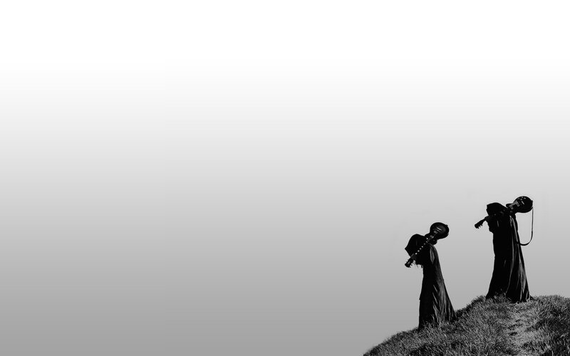 silhouettes on a hill