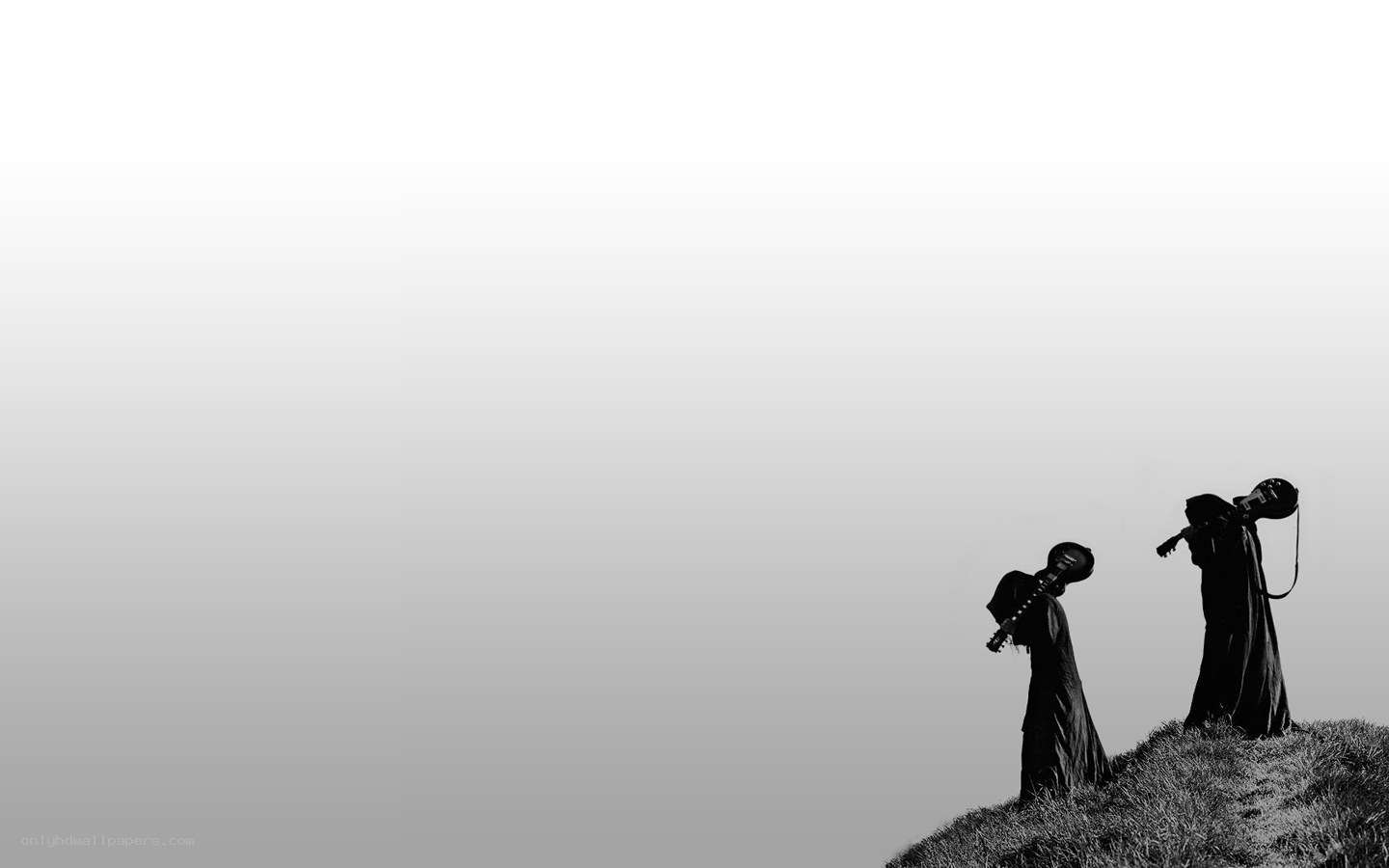 silhouettes on a hill