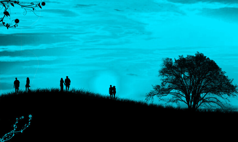 Silhouettes on a hill at dusk