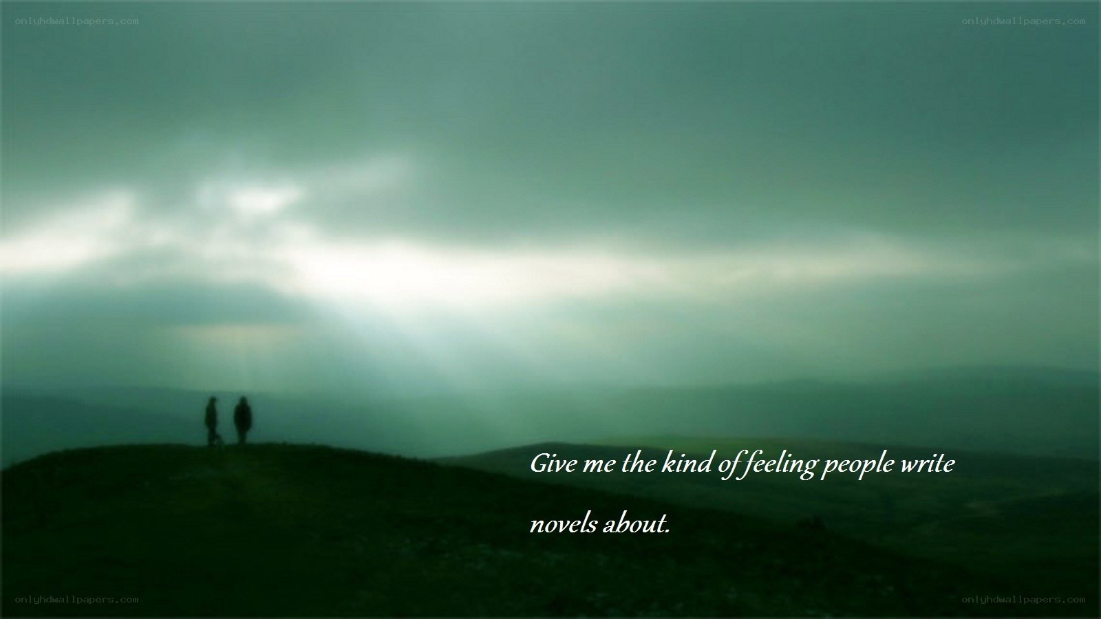 silhouettes on a hill at dusk