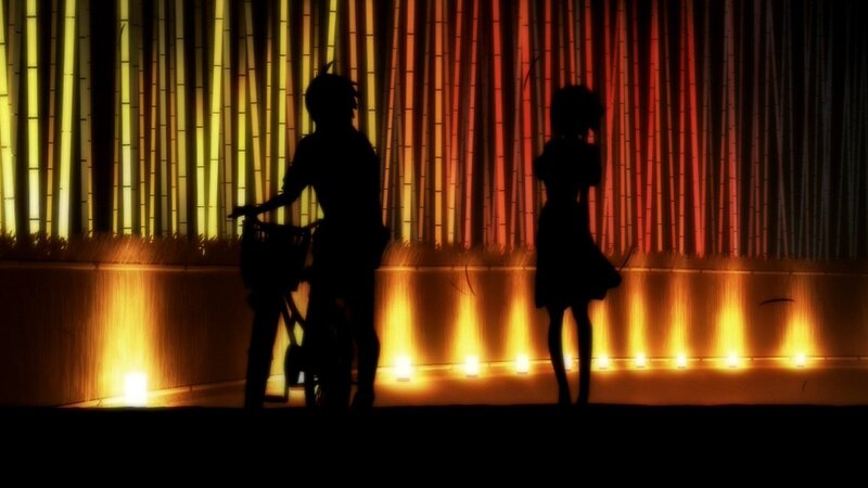 silhouettes on a lit stage