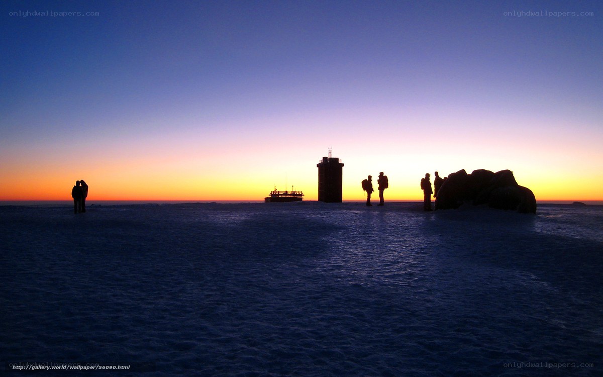 Silhouettes on a snowy landscape
