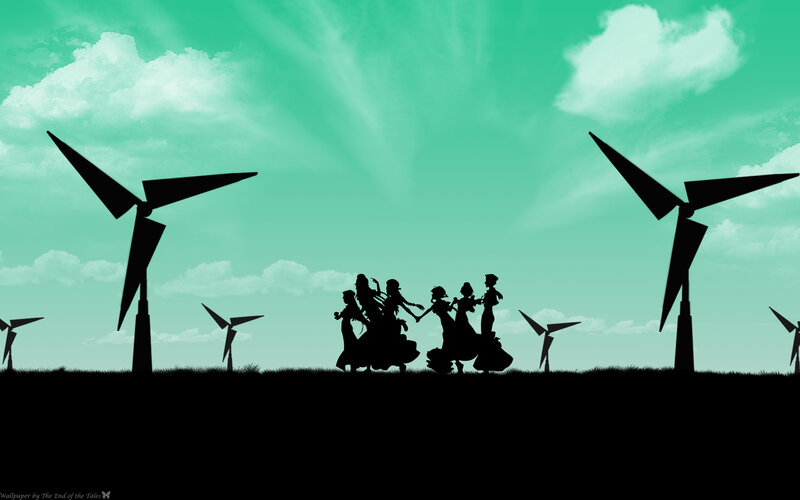 Silhouettes on a wind farm