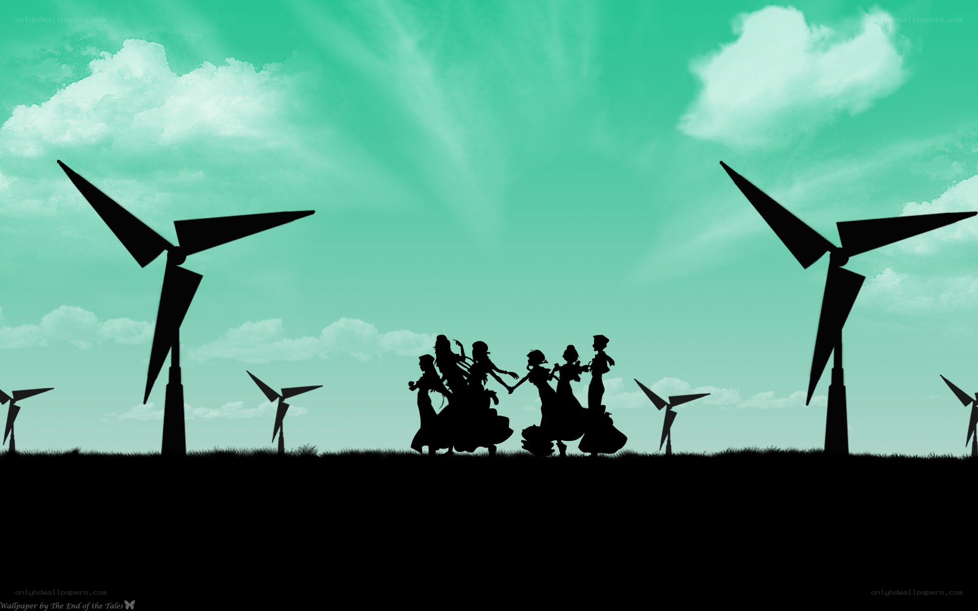 Silhouettes on a wind farm