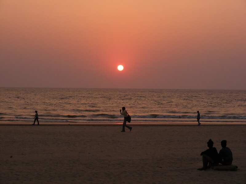Silhouettes on Beach at Sunset — Orange