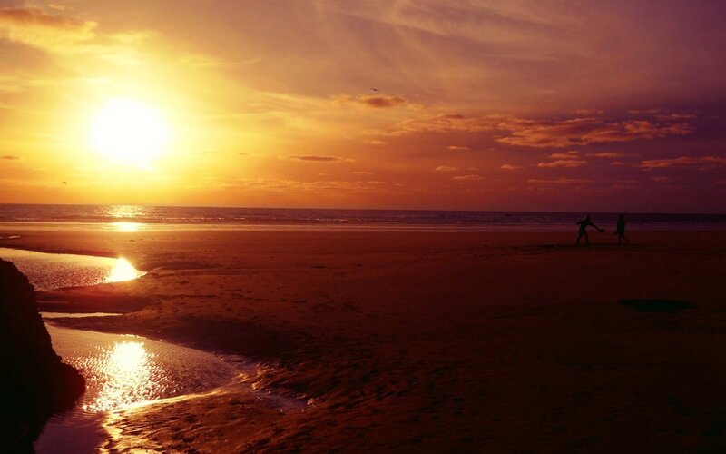 Silhouettes on Beach — Orange, Dramatic, Sunset