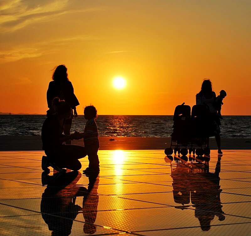 Silhouettes on Beach — Orange, Serene, Sunset, Photograph, Sun
