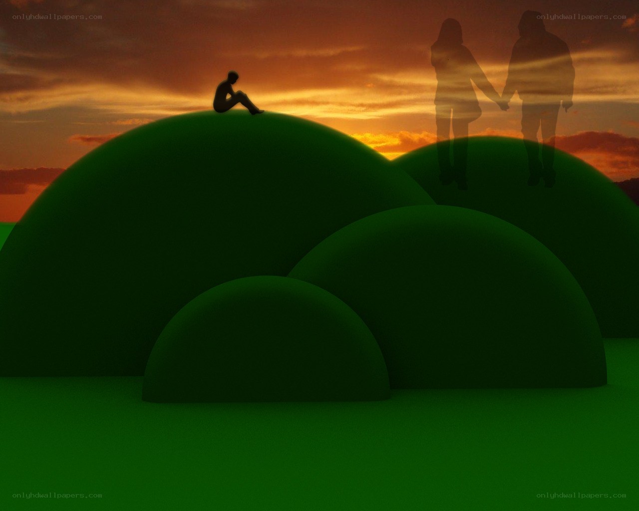 Silhouettes on green hills at sunset