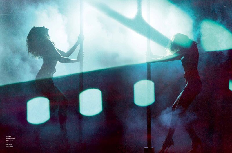 Silhouettes on poles in smoke