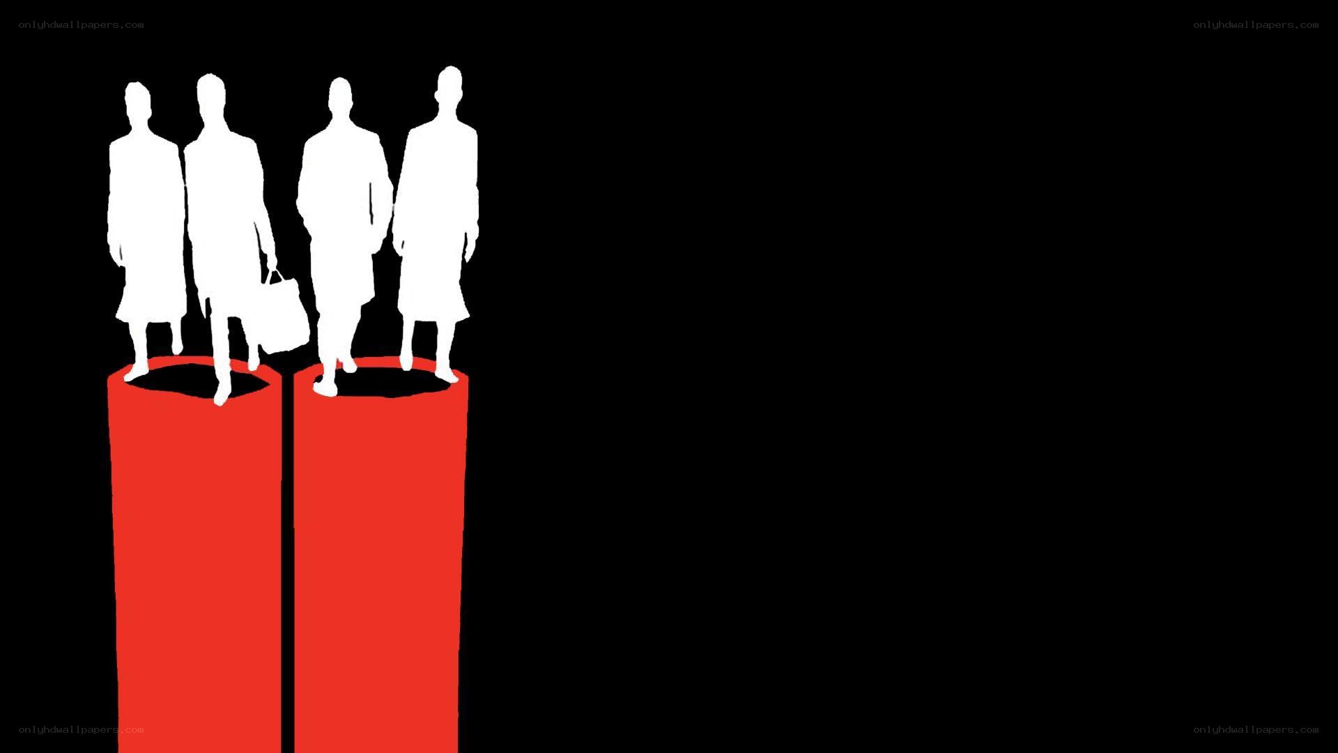 silhouettes on red pillars