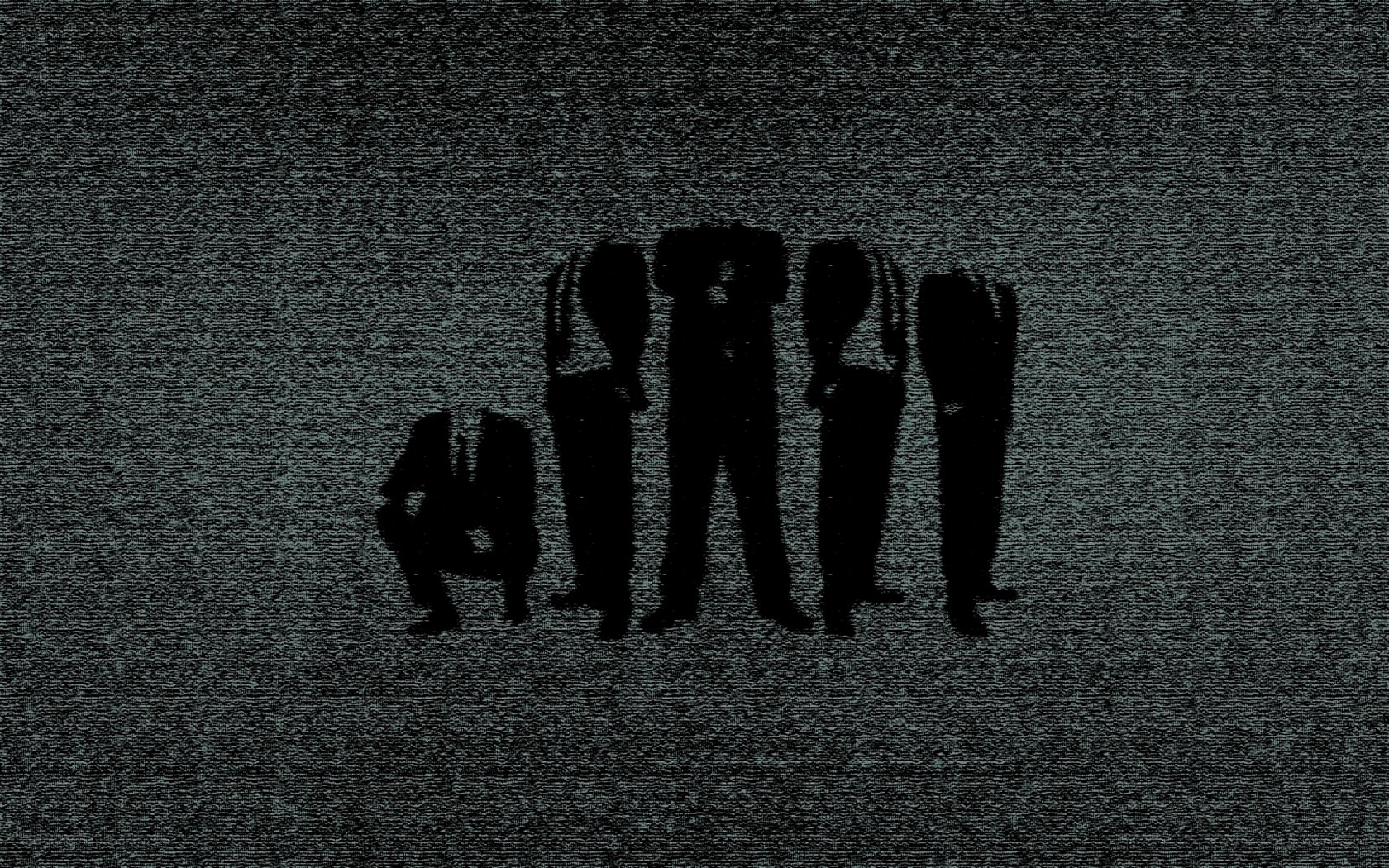 silhouettes on static screen
