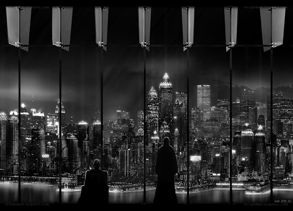 Silhouettes overlooking city