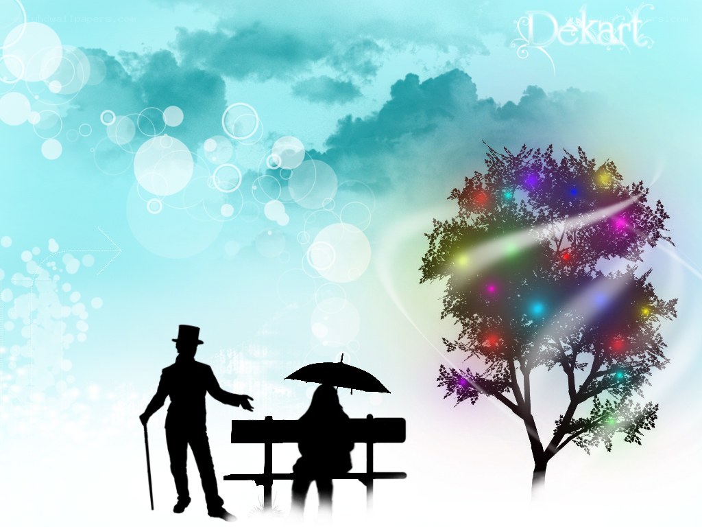 Silhouettes under a colorful tree