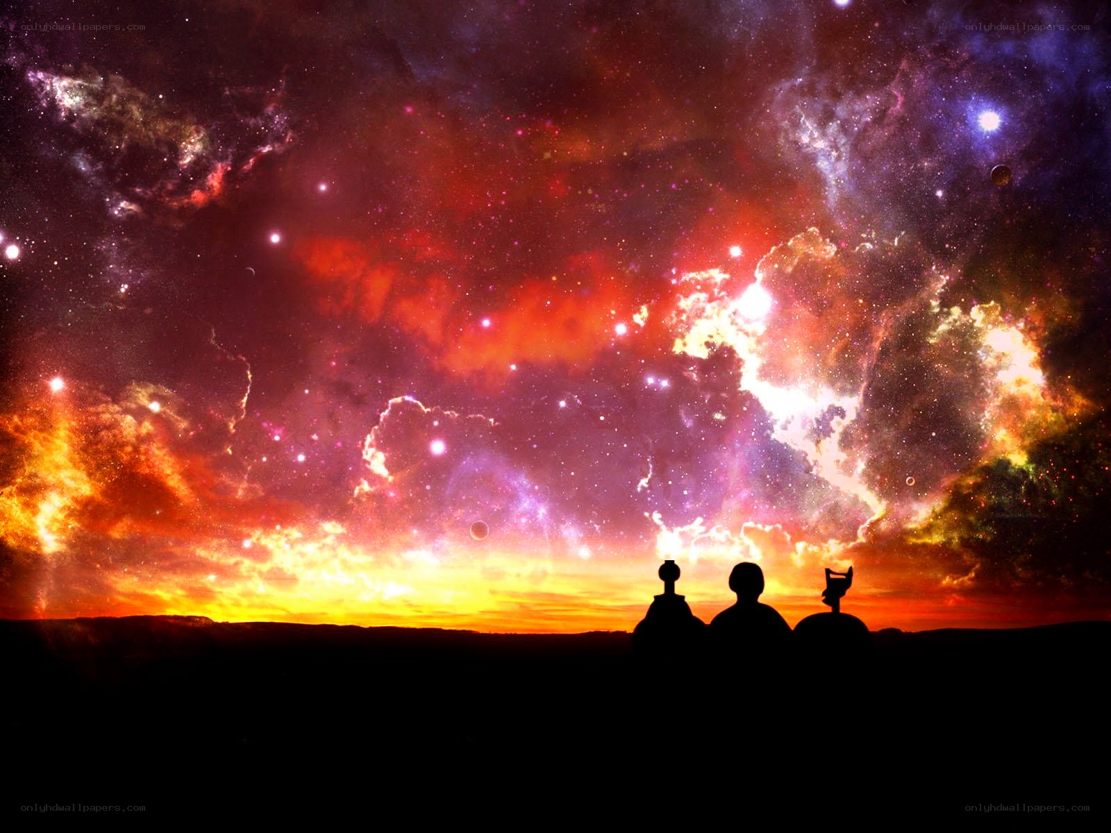 Silhouettes under a cosmic sky