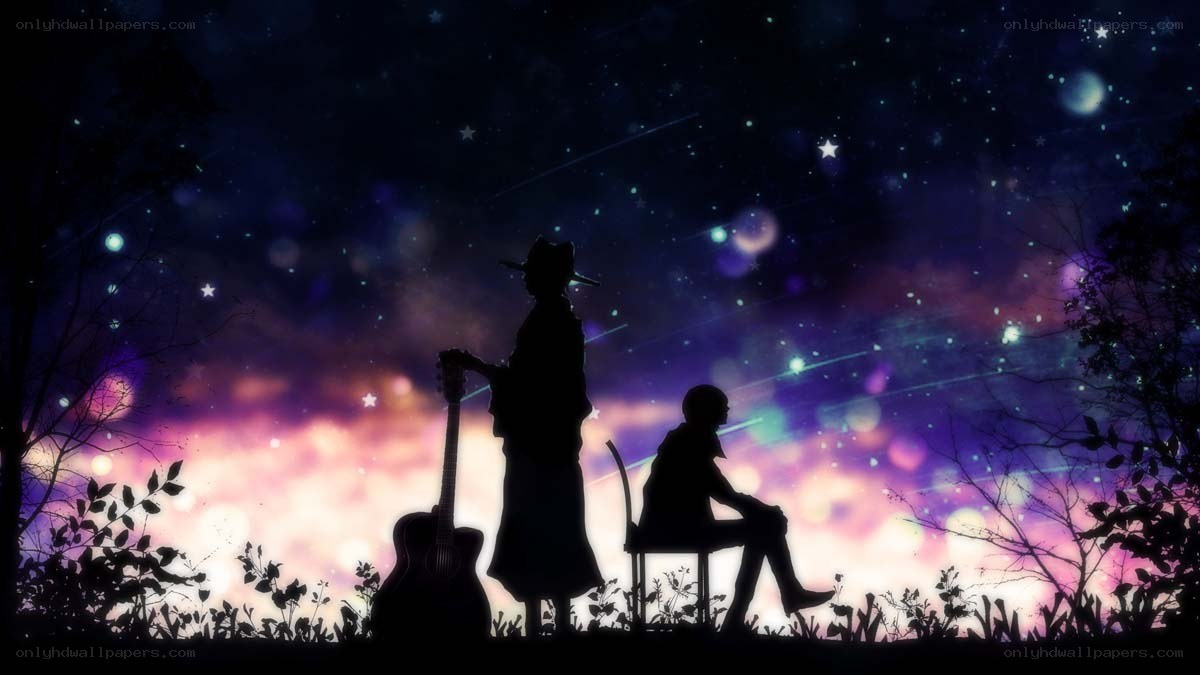 Silhouettes under a starry sky
