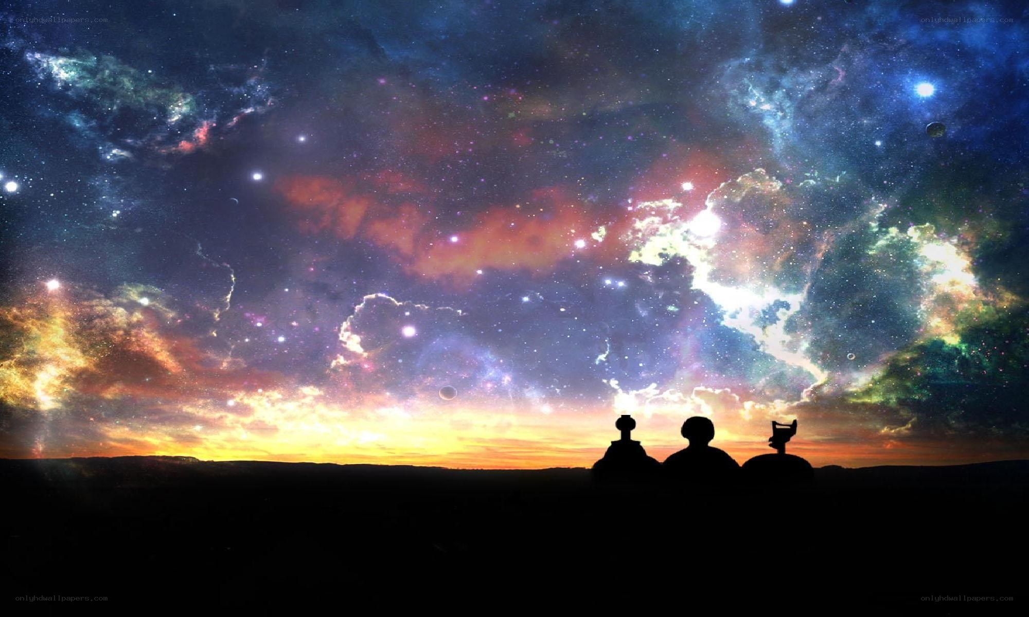 Silhouettes under a starry sky