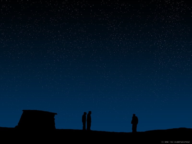 Silhouettes under starry sky