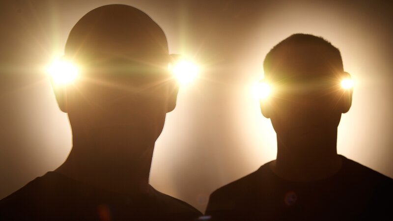 silhouettes with glowing lights