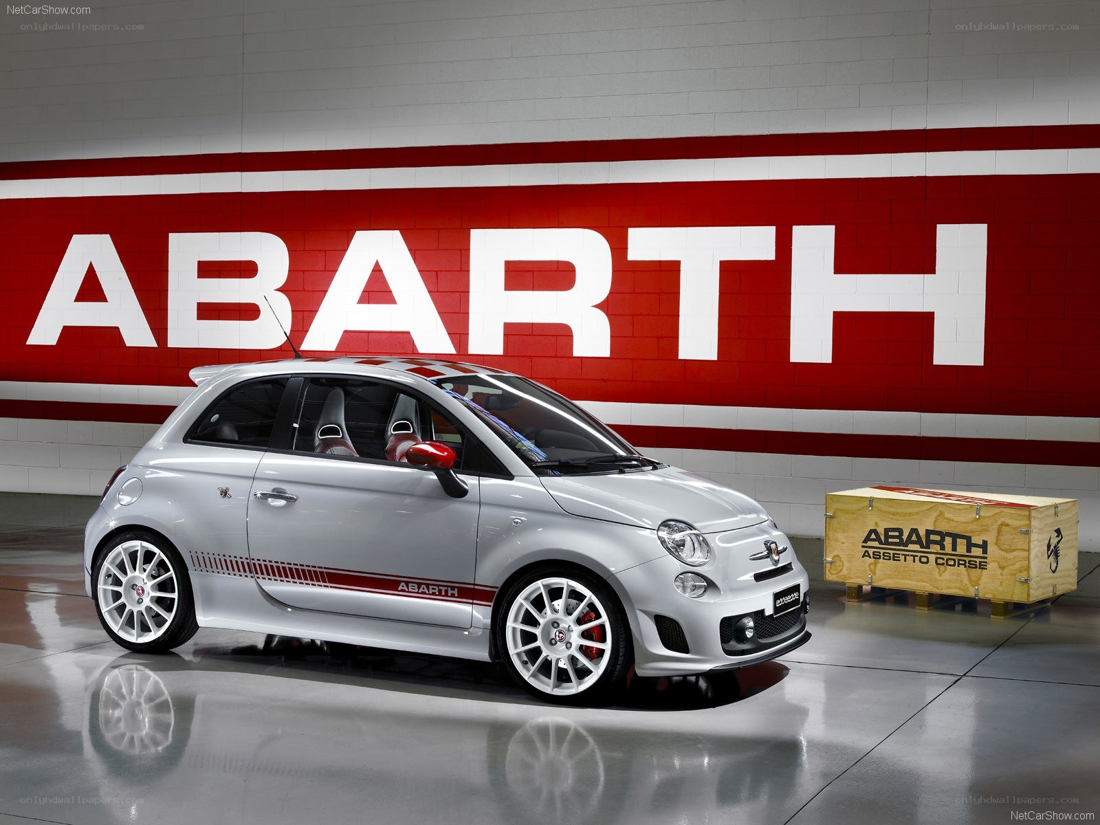 Silver Abarth car in showroom