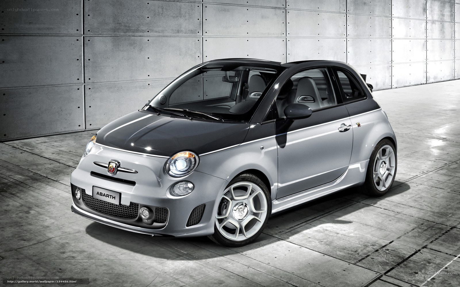 Silver Abarth car in studio