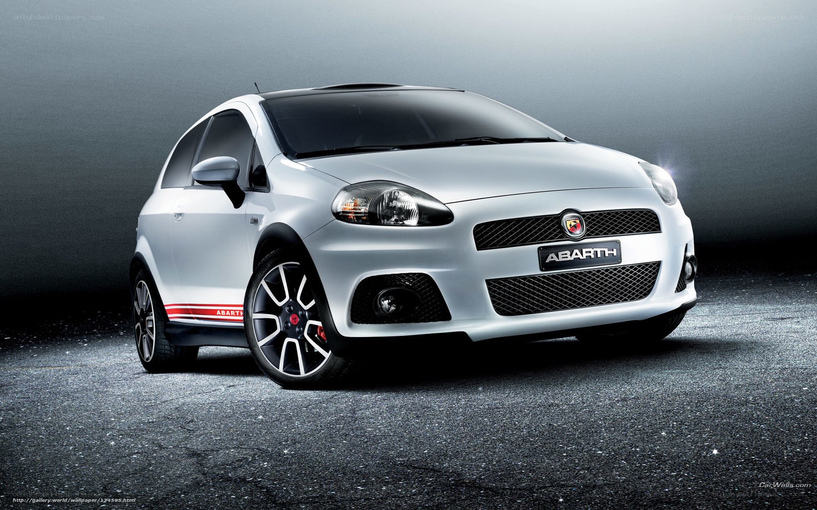 Silver Abarth car on dark background