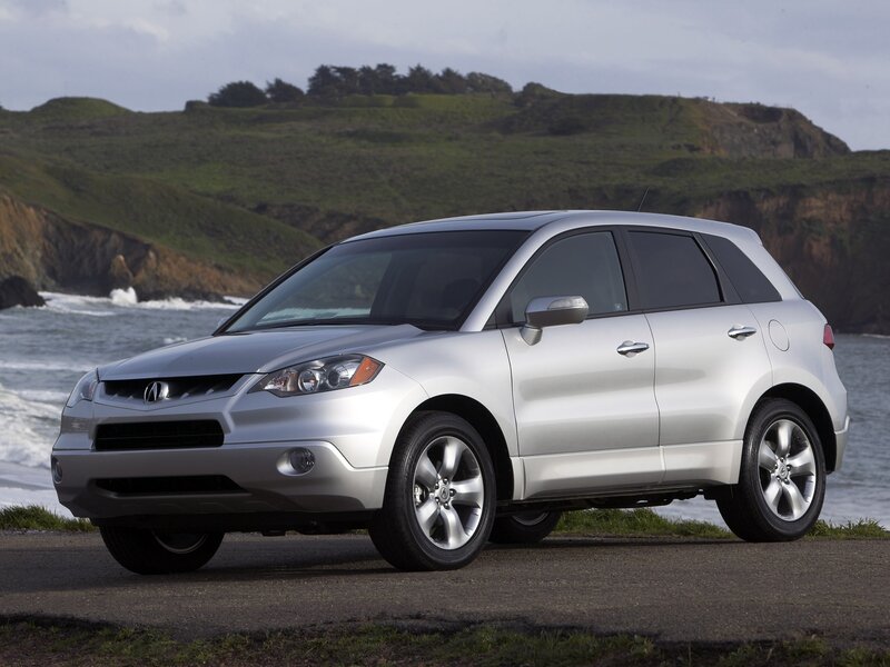 Silver Acura RDX by the coast