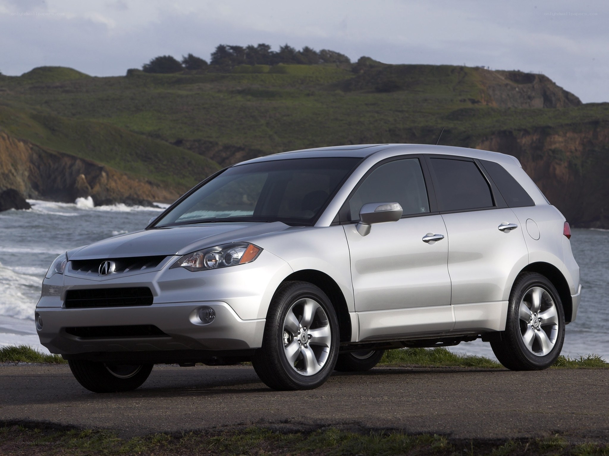 Silver Acura RDX by the coast
