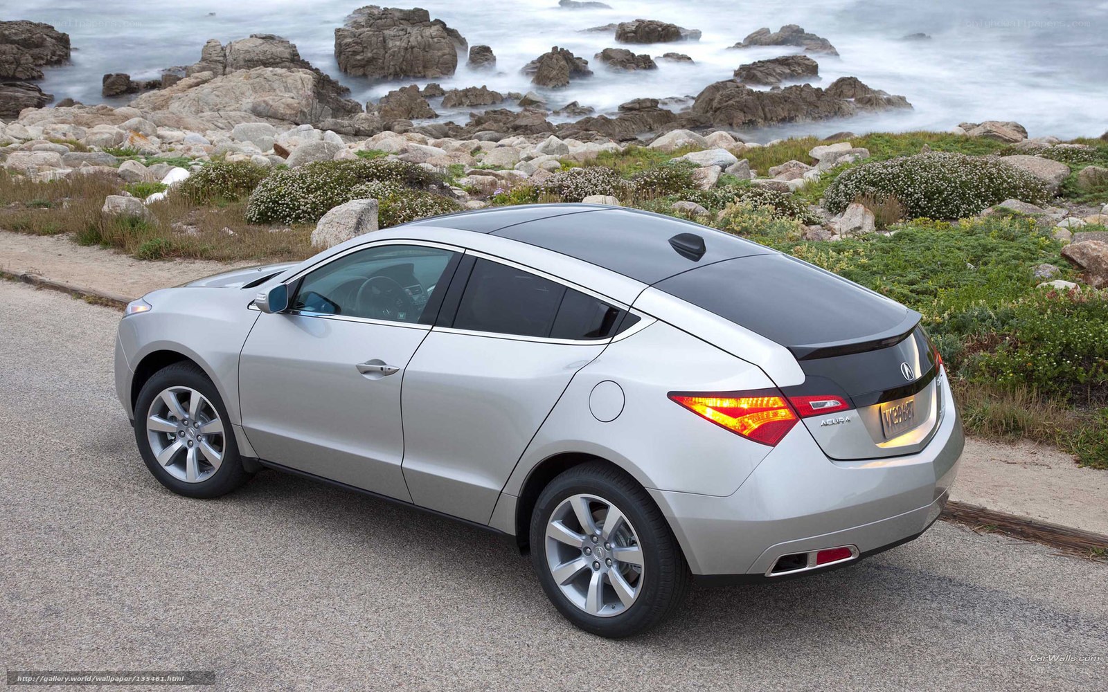 Silver Acura RDX by the coast