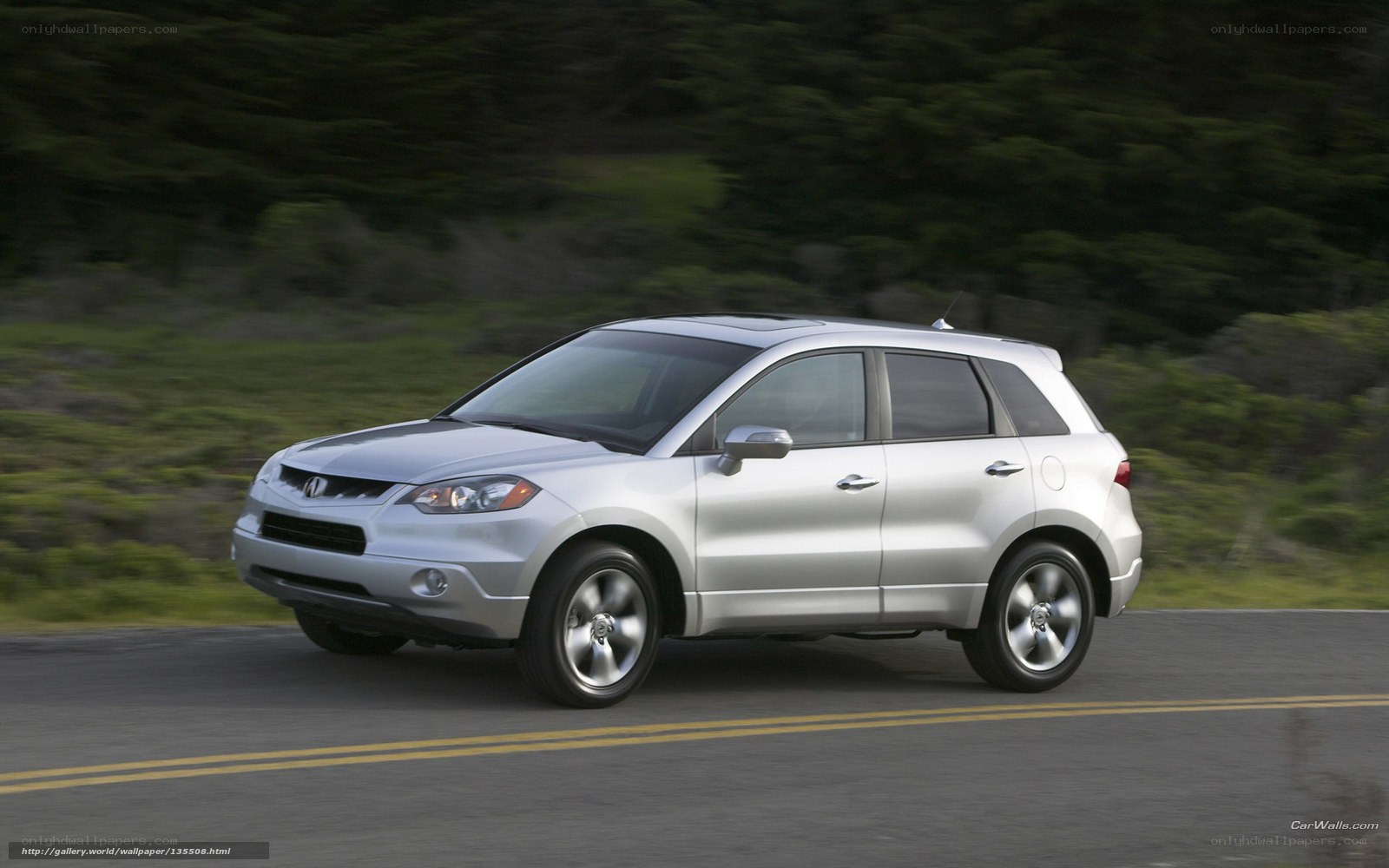 silver acura rdx driving on road