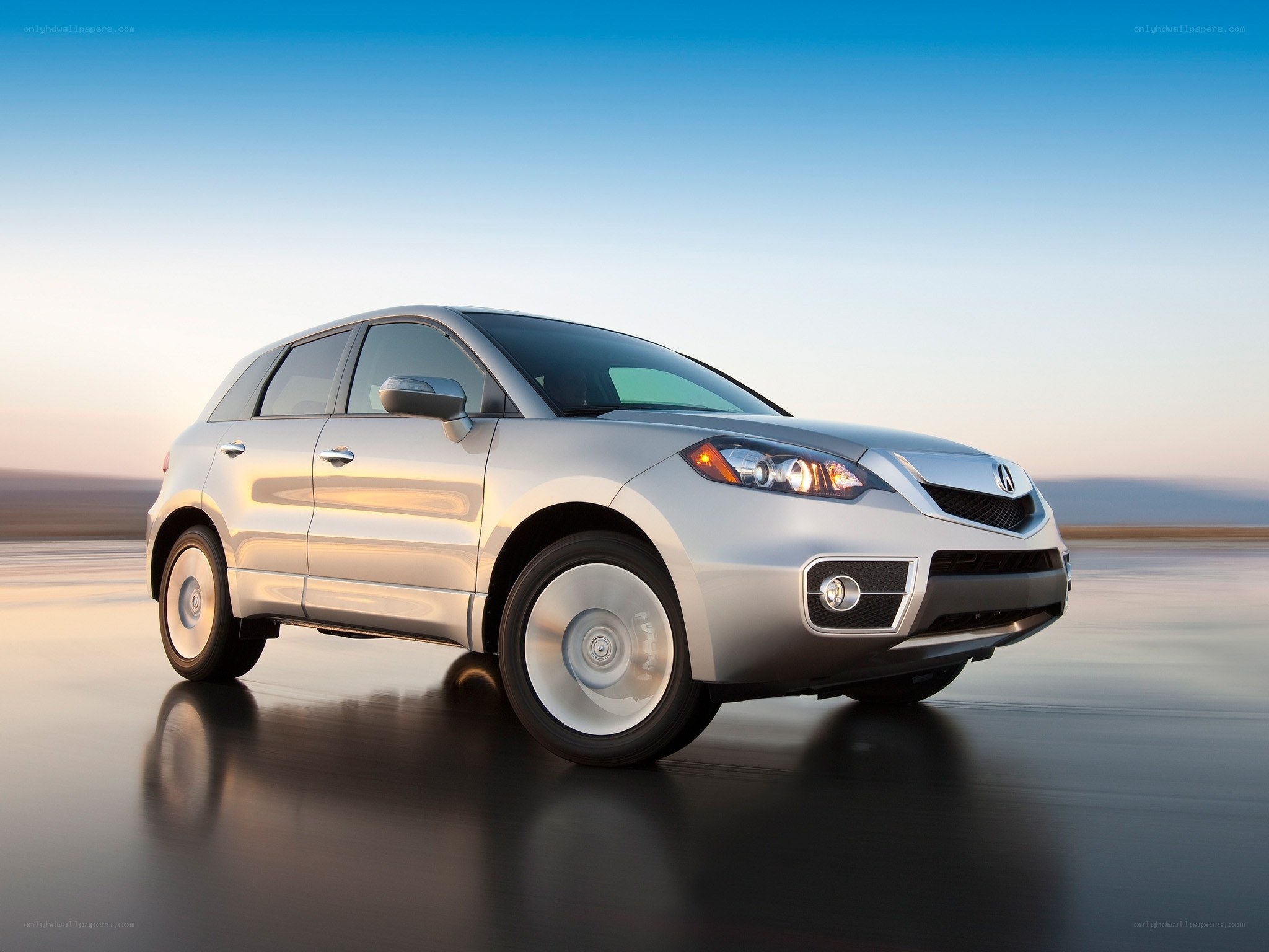 Silver Acura RDX in motion