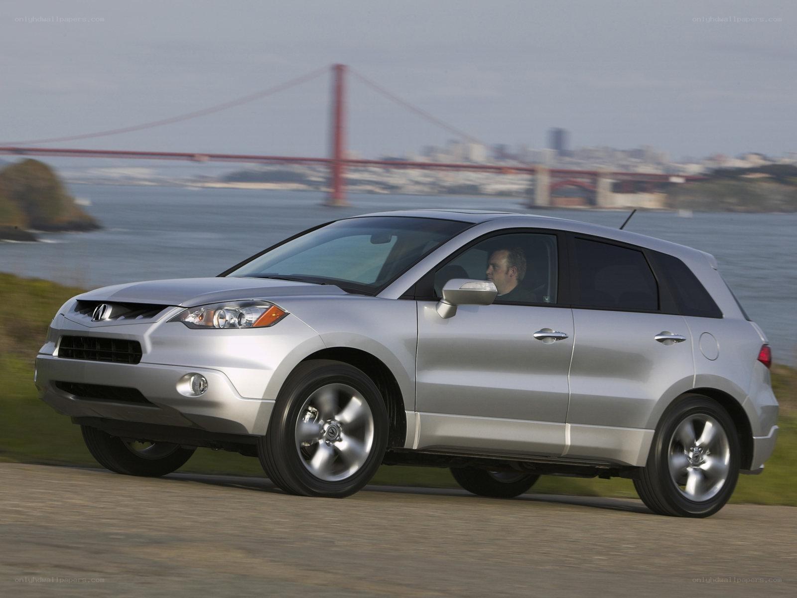 Silver Acura RDX on road