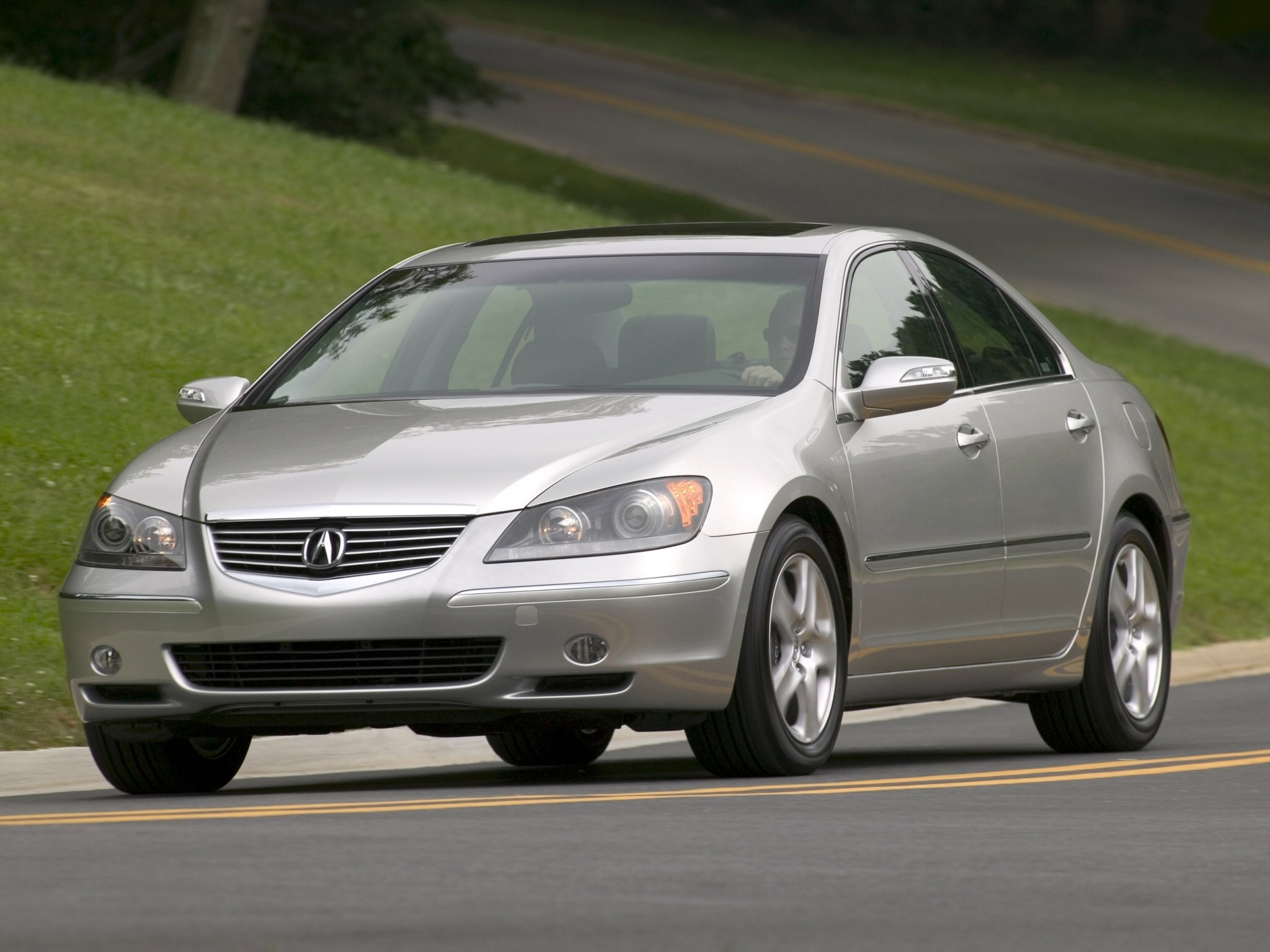 silver acura rl driving