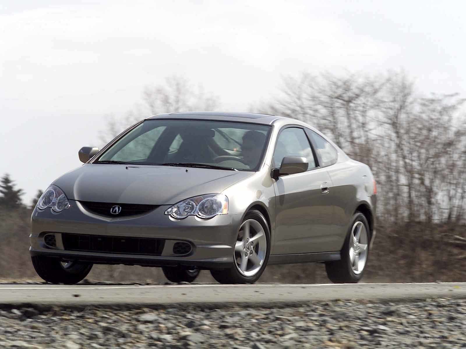 silver Acura RSX in motion