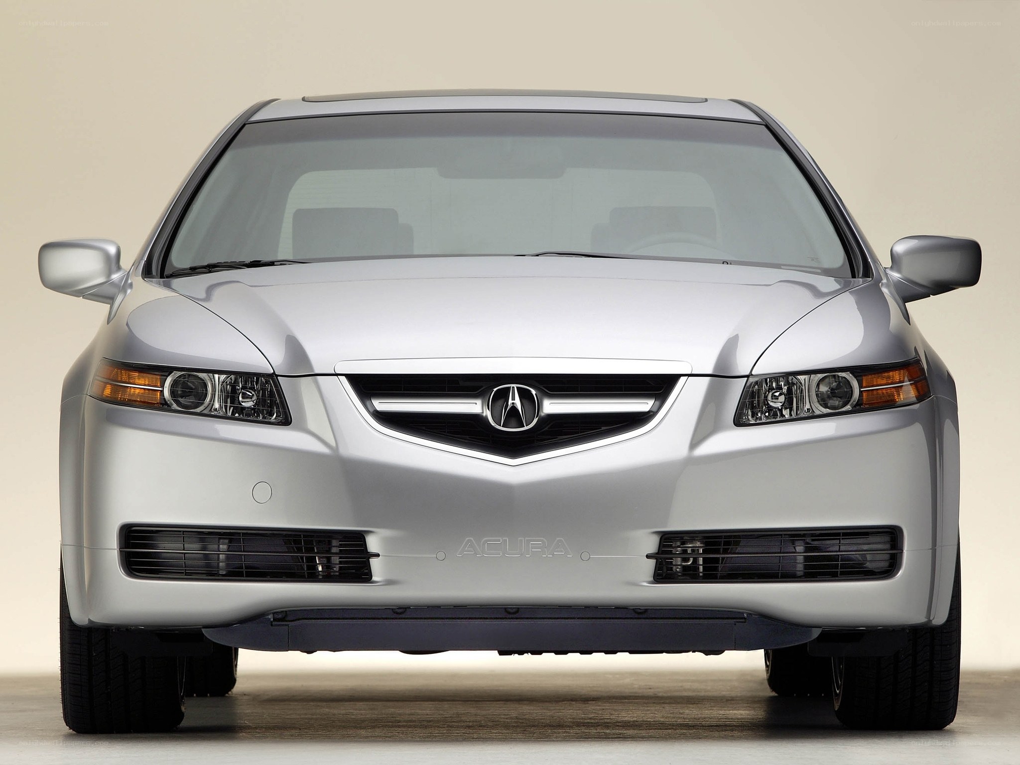 silver acura sedan front view