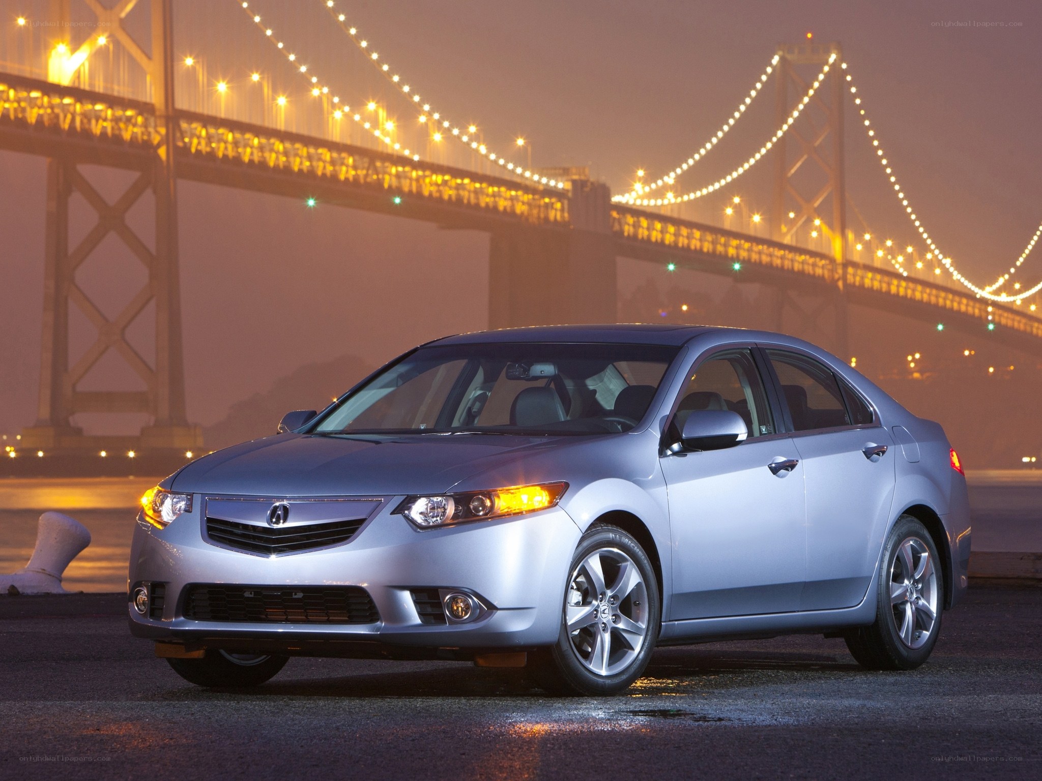 Silver Acura TL at night