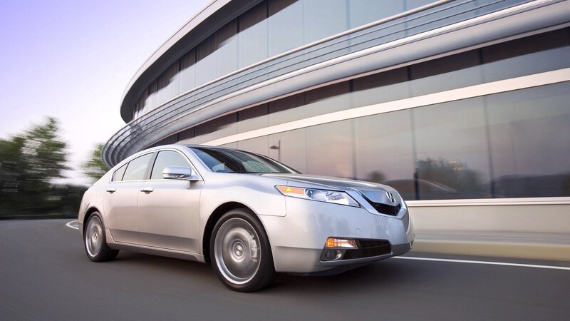 silver acura tl driving on road