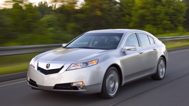 silver acura tl driving on road