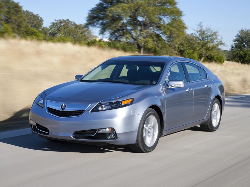 silver acura tl driving on road