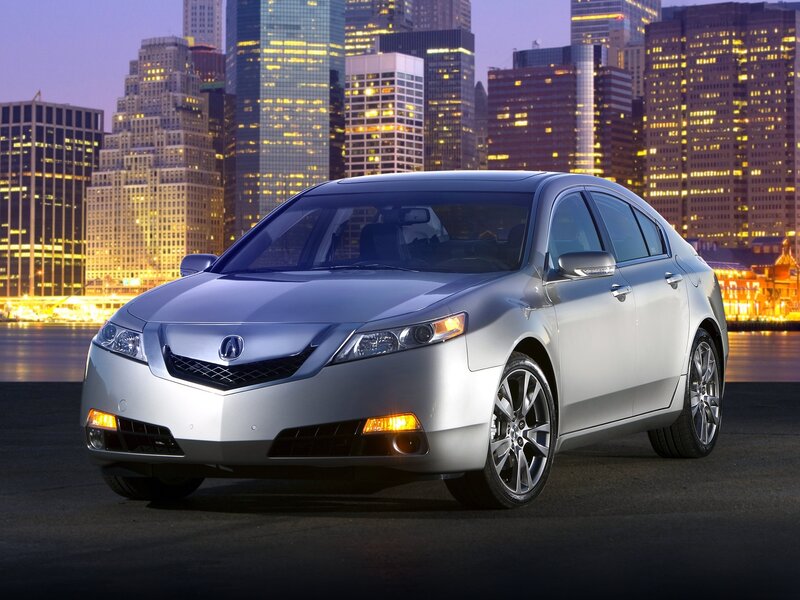 Silver Acura TL in city