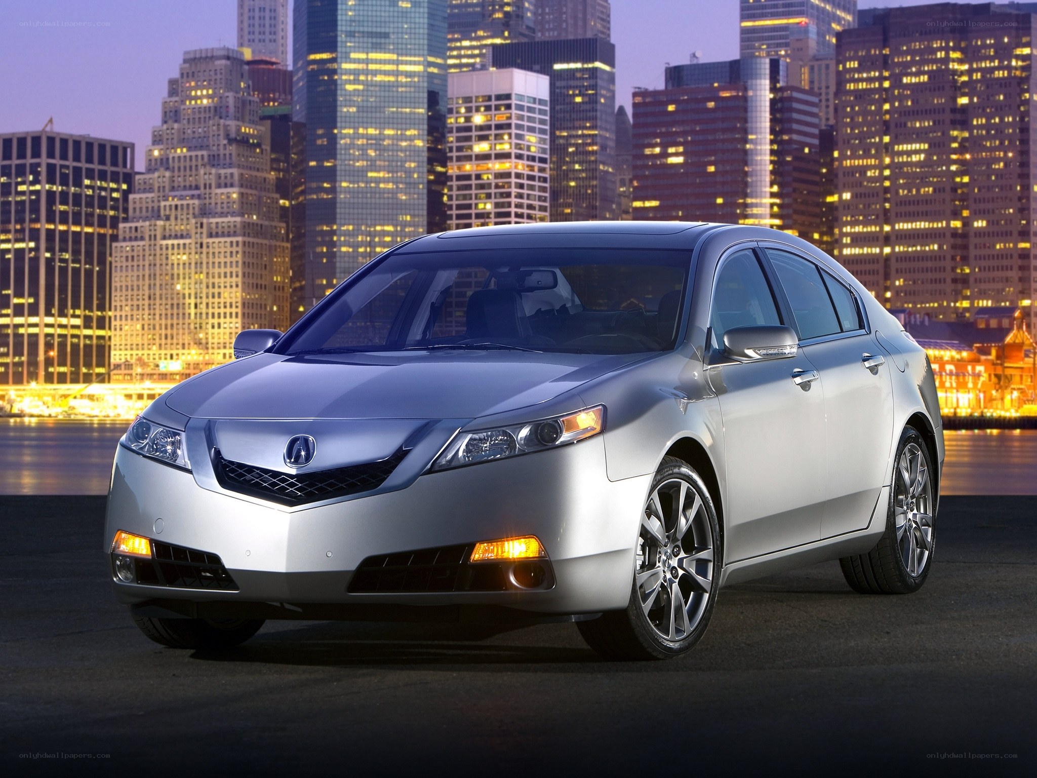 Silver Acura TL in city