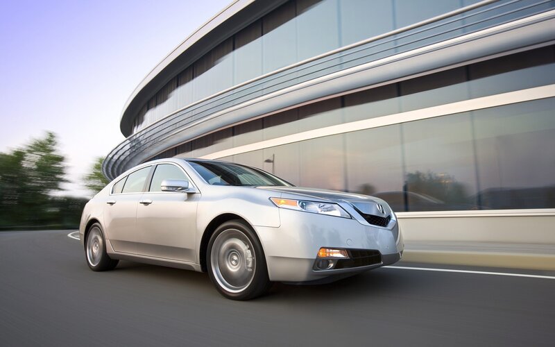 Silver Acura TL in motion