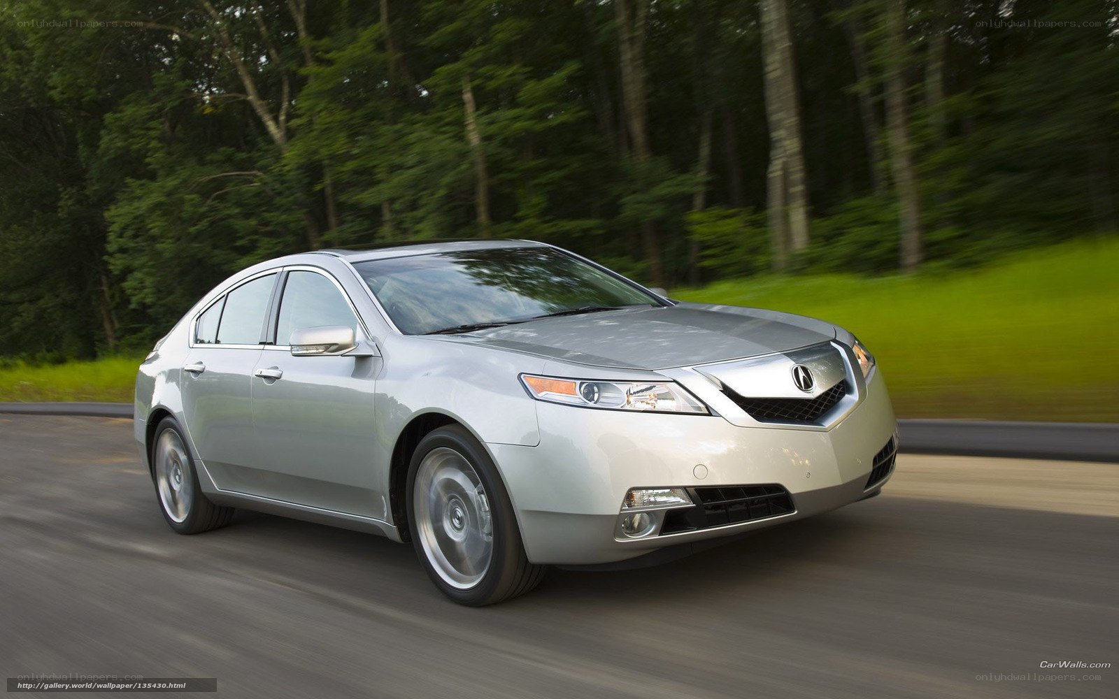 Silver Acura TL in motion